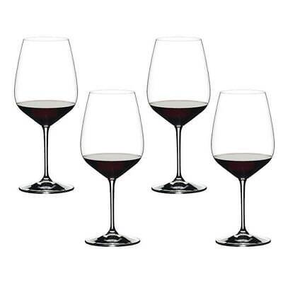 Four large-bowled red wine glasses with faceted bowls, shown together.